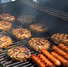 burgers and hotdogs grilling